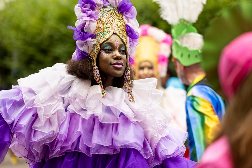 Brightly dressed performer at the Leyton Mas Carnival in 2025
